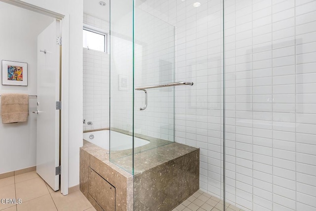 940 E 2nd St Unit 37, Los Angeles, CA 90012 - bathroom with a tile shower, a tub to relax in, and tile patterned floors