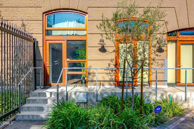 940 E 2nd St Unit 37, Los Angeles, CA 90012 - entrance to property with brick siding