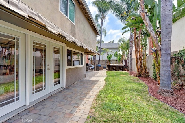22702 Islamare Ln, Lake Forest, CA 92630 - view of yard featuring french doors and a patio