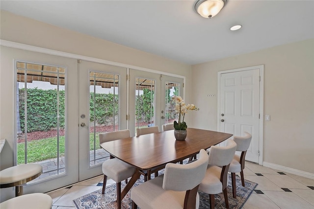 22702 Islamare Ln, Lake Forest, CA 92630 - dining area featuring french doors, light tile patterned flooring, and baseboards