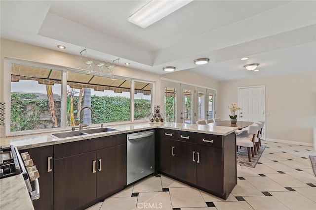 22702 Islamare Ln, Lake Forest, CA 92630 - kitchen featuring stainless steel dishwasher, a sink, range, recessed lighting, and light stone countertops