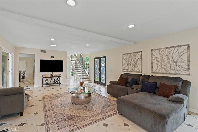22702 Islamare Ln, Lake Forest, CA 92630 - living area with recessed lighting, french doors, beam ceiling, baseboards, and stairs