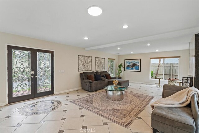 22702 Islamare Ln, Lake Forest, CA 92630 - living room with french doors, baseboards, recessed lighting, and light tile patterned floors