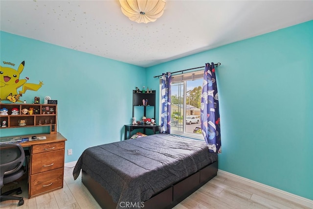 22702 Islamare Ln, Lake Forest, CA 92630 - bedroom featuring light wood-style floors, baseboards, and an office area
