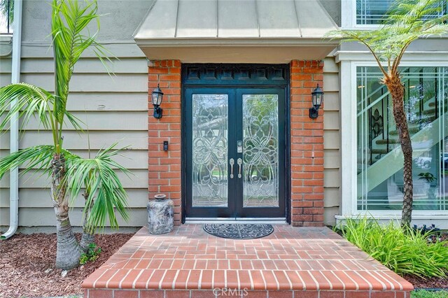 22702 Islamare Ln, Lake Forest, CA 92630 - entrance to property with french doors and brick siding