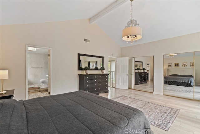 22702 Islamare Ln, Lake Forest, CA 92630 - bedroom with wood finished floors, beam ceiling, two closets, high vaulted ceiling, and connected bathroom