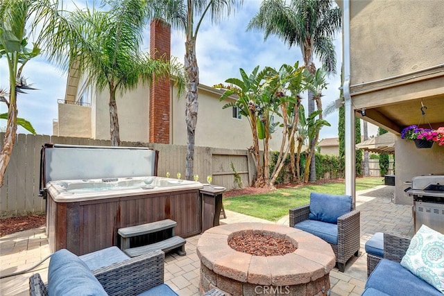 22702 Islamare Ln, Lake Forest, CA 92630 - fenced backyard with a hot tub, a patio, and a fire pit