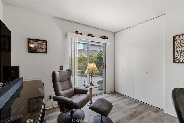 1724 N Oakwood Ave, Anaheim, CA 92807 - living area featuring light wood-style flooring