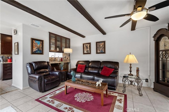 1724 N Oakwood Ave, Anaheim, CA 92807 - living area featuring light tile patterned floors, ceiling fan, and beam ceiling