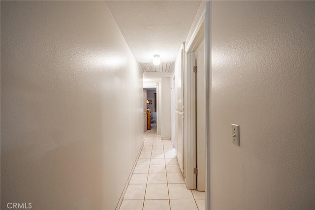 1390 Corona Ave, Norco, CA 92860 - hall featuring light tile patterned flooring and attic access