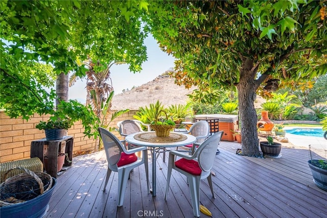 1390 Corona Ave, Norco, CA 92860 - deck featuring a covered hot tub and outdoor dining area