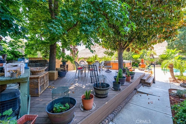1390 Corona Ave, Norco, CA 92860 - deck with outdoor dining space and an outdoor hot tub