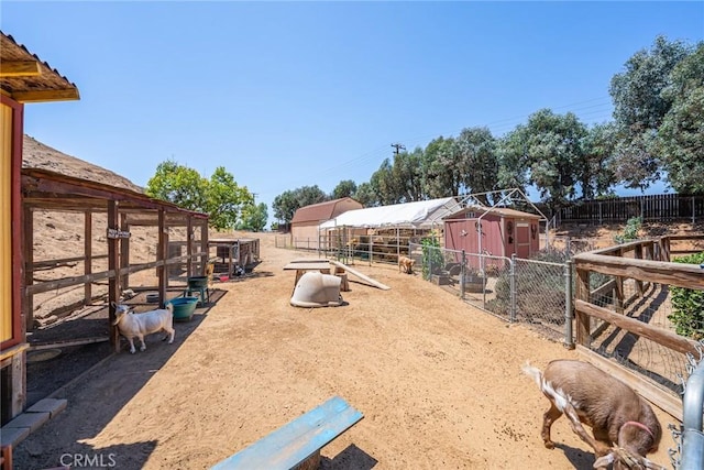 1390 Corona Ave, Norco, CA 92860 - view of yard featuring an outbuilding and an exterior structure
