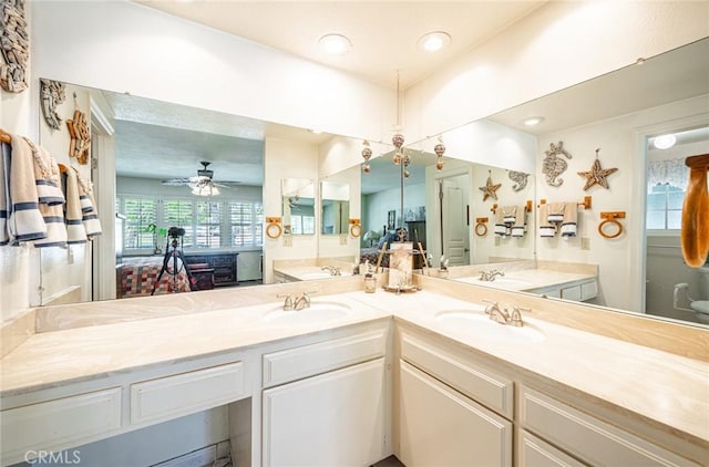 1390 Corona Ave, Norco, CA 92860 - bathroom featuring double vanity and ceiling fan