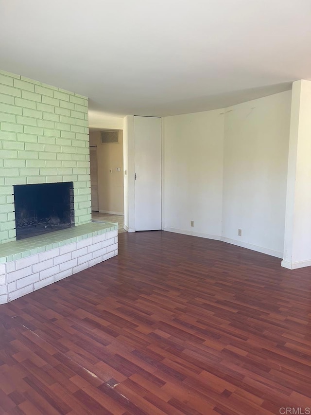 1901 Esplendido Ave, Vista, CA 92084 - unfurnished living room with wood finished floors, baseboards, and a fireplace