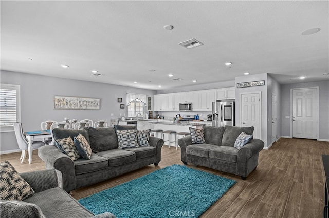 24909 Miners View Ln, Moreno Valley, CA 92557 - living area with recessed lighting and wood finished floors