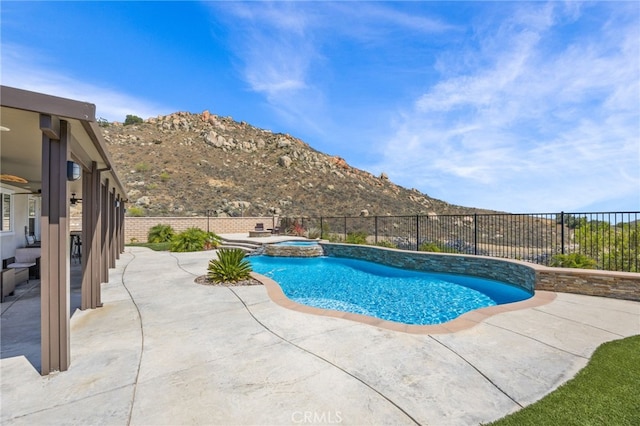 24909 Miners View Ln, Moreno Valley, CA 92557 - view of pool featuring a patio area, a fenced backyard, and a pool with connected hot tub