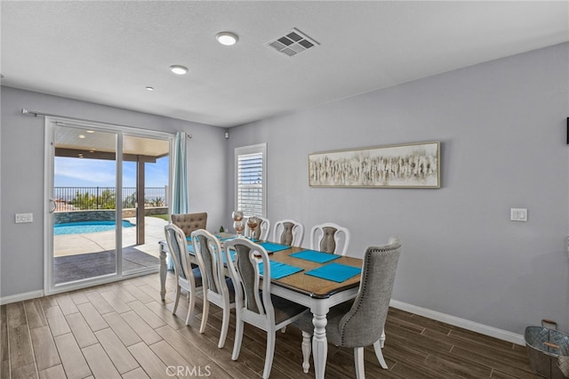24909 Miners View Ln, Moreno Valley, CA 92557 - dining area featuring wood finish floors and baseboards