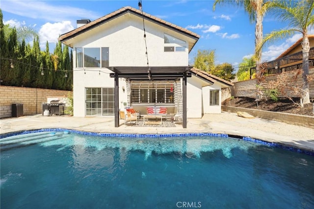 28034 Parkridge Ln, Canyon Country, CA 91387 - rear view of property with stucco siding, a patio area, a fenced backyard, and a chimney