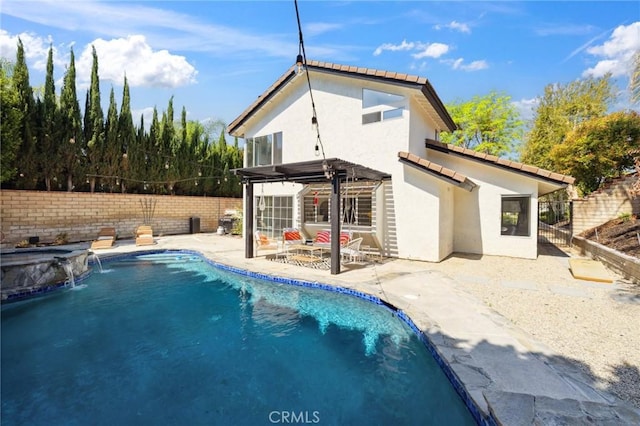 28034 Parkridge Ln, Canyon Country, CA 91387 - rear view of property featuring stucco siding, a fenced backyard, a patio area, a tile roof, and a pool with connected hot tub