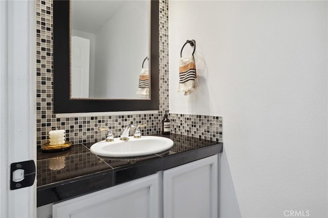 28034 Parkridge Ln, Canyon Country, CA 91387 - bathroom featuring vanity and decorative backsplash