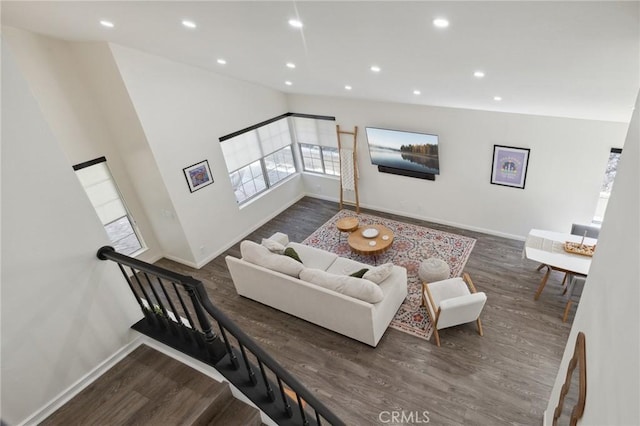 28034 Parkridge Ln, Canyon Country, CA 91387 - living room with wood finished floors, recessed lighting, high vaulted ceiling, and stairs