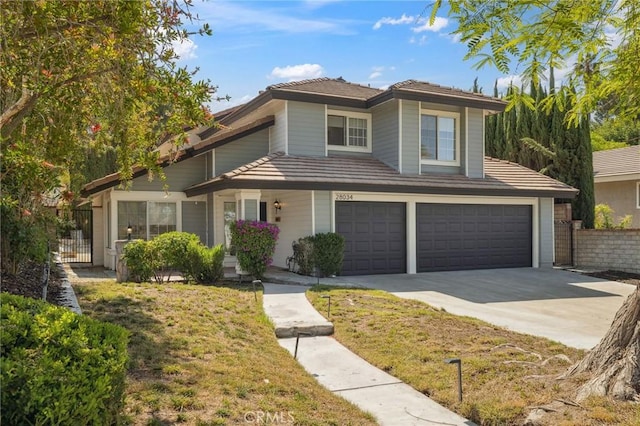 28034 Parkridge Ln, Canyon Country, CA 91387 - traditional-style house with an attached garage and driveway
