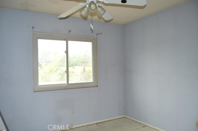 12077 Swegles Ln, Moreno Valley, CA 92557 - unfurnished room featuring healthy amount of natural light and a ceiling fan