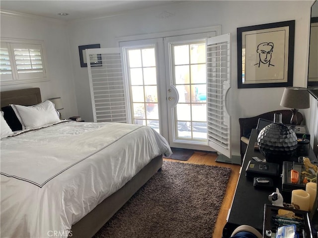 357 Cumberland Rd, Glendale, CA 91202 - bedroom with wood finished floors, access to exterior, and ornamental molding