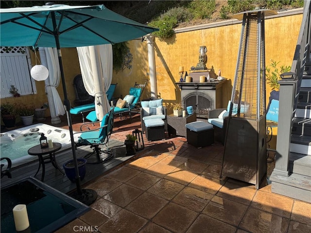 357 Cumberland Rd, Glendale, CA 91202 - view of patio / terrace with a hot tub and an outdoor hangout area