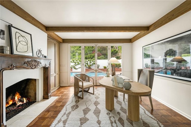 508 Evening Star Ln, Newport Beach, CA 92660 - dining area featuring beamed ceiling, a tiled fireplace, and baseboards