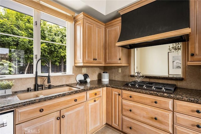 508 Evening Star Ln, Newport Beach, CA 92660 - kitchen featuring a sink, premium range hood, gas stovetop, decorative backsplash, and dark stone counters