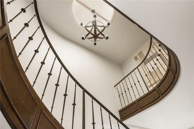 508 Evening Star Ln, Newport Beach, CA 92660 - staircase with a chandelier and a towering ceiling