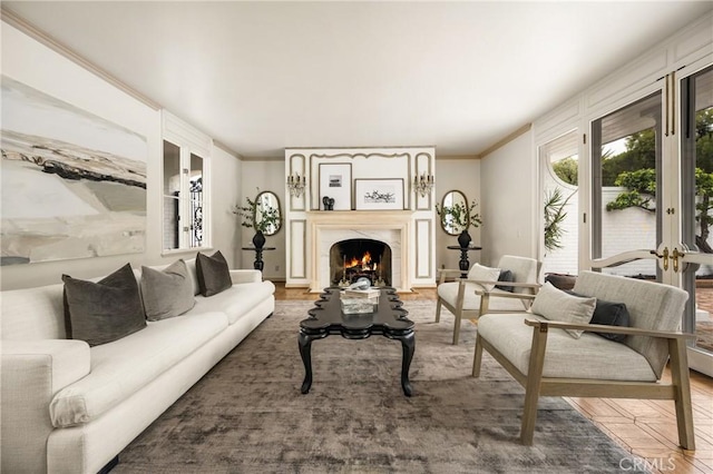 508 Evening Star Ln, Newport Beach, CA 92660 - living room featuring crown molding, a warm lit fireplace, and wood finished floors