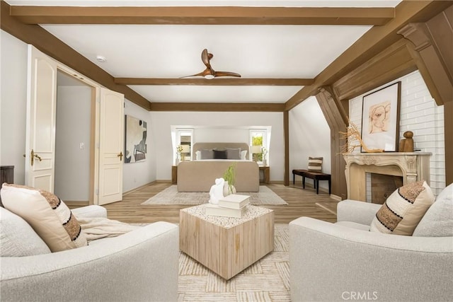 508 Evening Star Ln, Newport Beach, CA 92660 - living room with beamed ceiling, baseboards, light wood-type flooring, and a fireplace