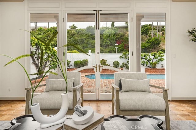 508 Evening Star Ln, Newport Beach, CA 92660 - sitting room featuring plenty of natural light, baseboards, and french doors