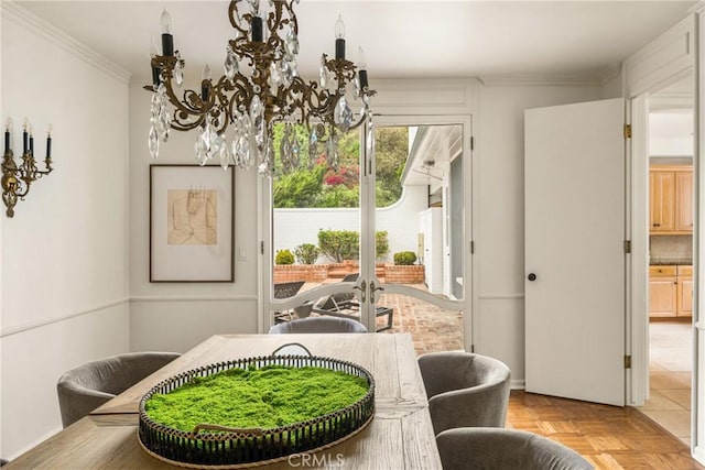 508 Evening Star Ln, Newport Beach, CA 92660 - dining space featuring ornamental molding, a chandelier, and french doors