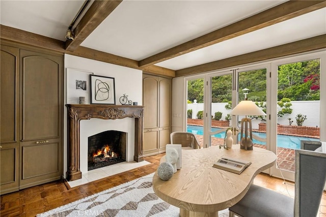 508 Evening Star Ln, Newport Beach, CA 92660 - dining room with a fireplace with flush hearth, french doors, and beamed ceiling