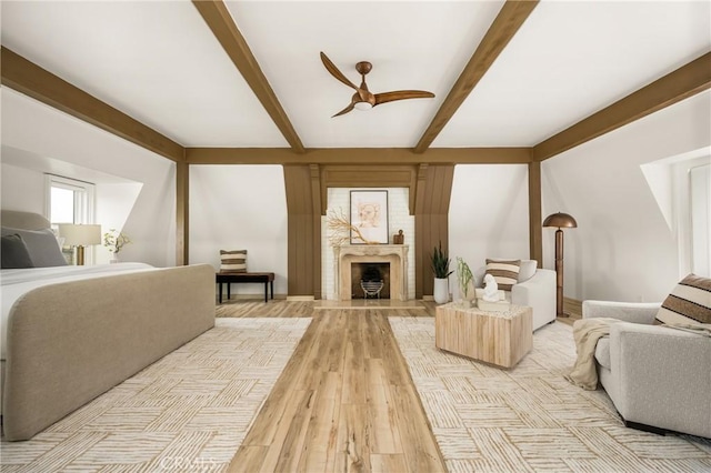508 Evening Star Ln, Newport Beach, CA 92660 - bedroom with beam ceiling, light wood-type flooring, a fireplace, and a ceiling fan