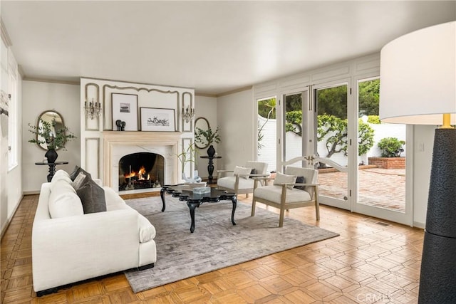 508 Evening Star Ln, Newport Beach, CA 92660 - living room featuring a high end fireplace, crown molding, and baseboards