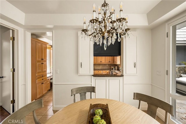 508 Evening Star Ln, Newport Beach, CA 92660 - tiled dining space featuring a chandelier