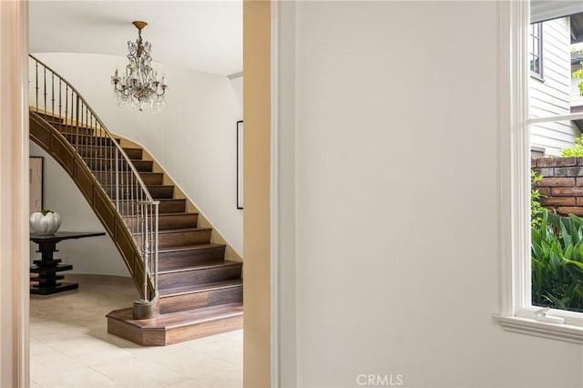 508 Evening Star Ln, Newport Beach, CA 92660 - staircase featuring a chandelier and tile patterned floors