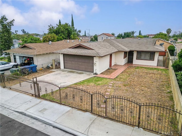 4820 Eagle St, Los Angeles, CA 90022 - ranch-style house featuring an attached garage, stucco siding, concrete driveway, a shingled roof, and a fenced front yard