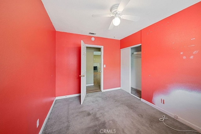 5150 N Berkeley Ave, San Bernardino, CA 92407 - unfurnished bedroom with carpet flooring, a closet, and a ceiling fan