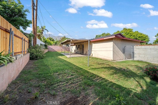 5150 N Berkeley Ave, San Bernardino, CA 92407 - fenced backyard featuring a patio