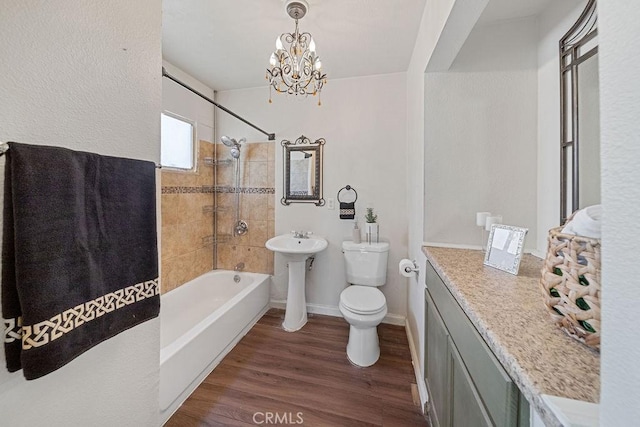 5150 N Berkeley Ave, San Bernardino, CA 92407 - full bath featuring wood finished floors, shower / washtub combination, and a chandelier