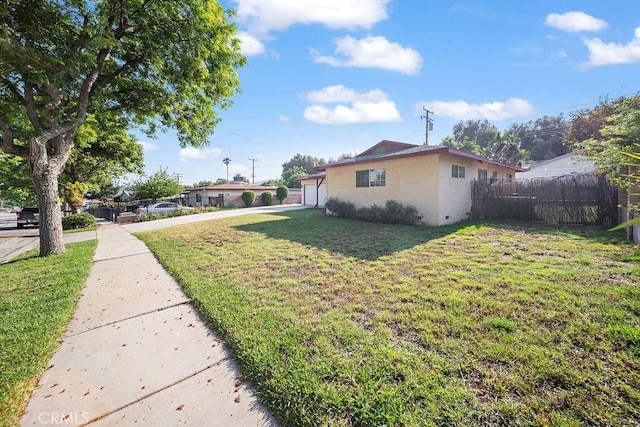 5150 N Berkeley Ave, San Bernardino, CA 92407 - view of yard with an attached garage
