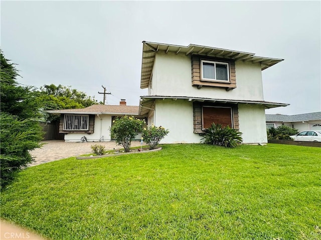 1947 Palm Ave, Monterey Park, CA 91755 - back of property featuring stucco siding and a lawn