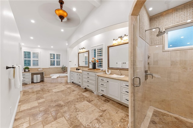 25811 Jamon Ln, Mission Viejo, CA 92691 - bathroom with vanity, a shower stall, a bath, recessed lighting, and stone tile flooring