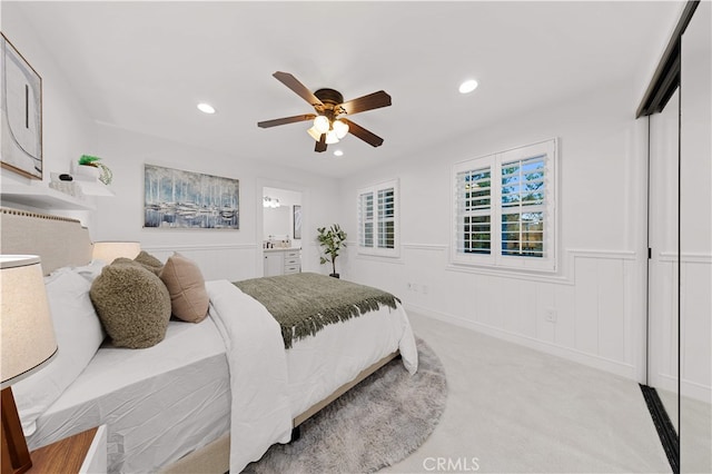 25811 Jamon Ln, Mission Viejo, CA 92691 - bedroom with light colored carpet, recessed lighting, a wainscoted wall, ceiling fan, and connected bathroom